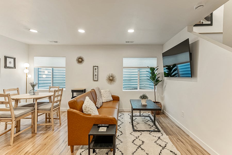 Living Area - Flowers have been added to window wells (maintained by owner, not tenant). 