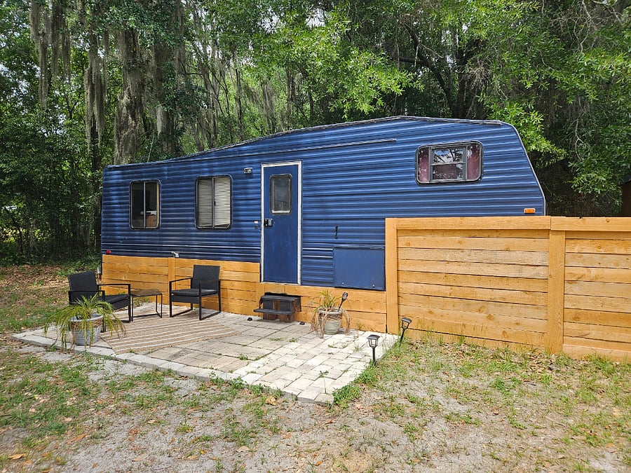 Expect campground style in the Back-40. Neighbors are also short-term professionals. Coming soon, shaded area dining area. Community charcoal grill and firepit available!
