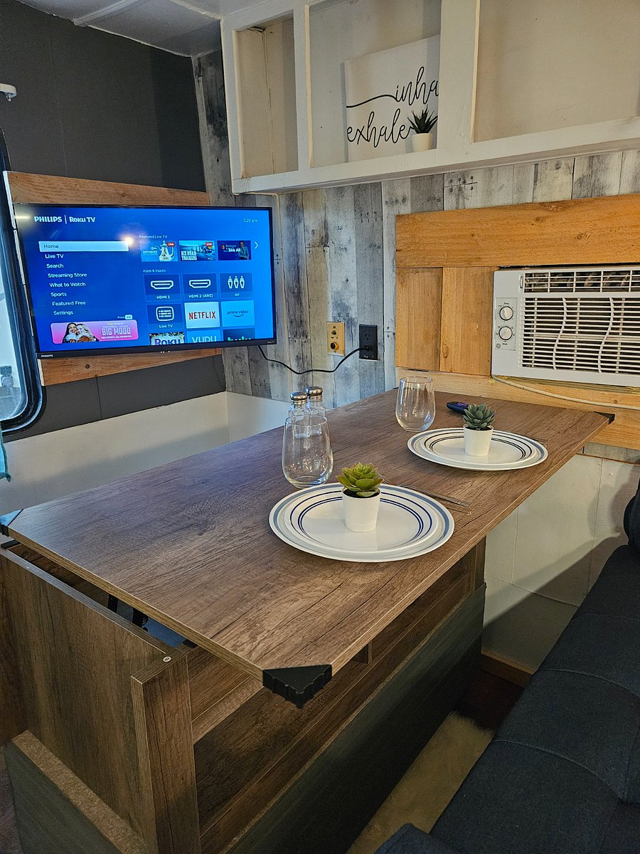 Coffee table lifts for dining and work station.