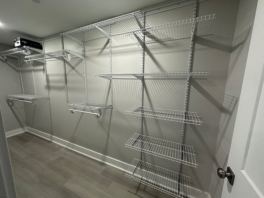 Huge bedroom closet (14ft) with closet system