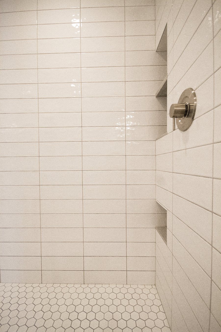 Tile shower with two rain shower heads