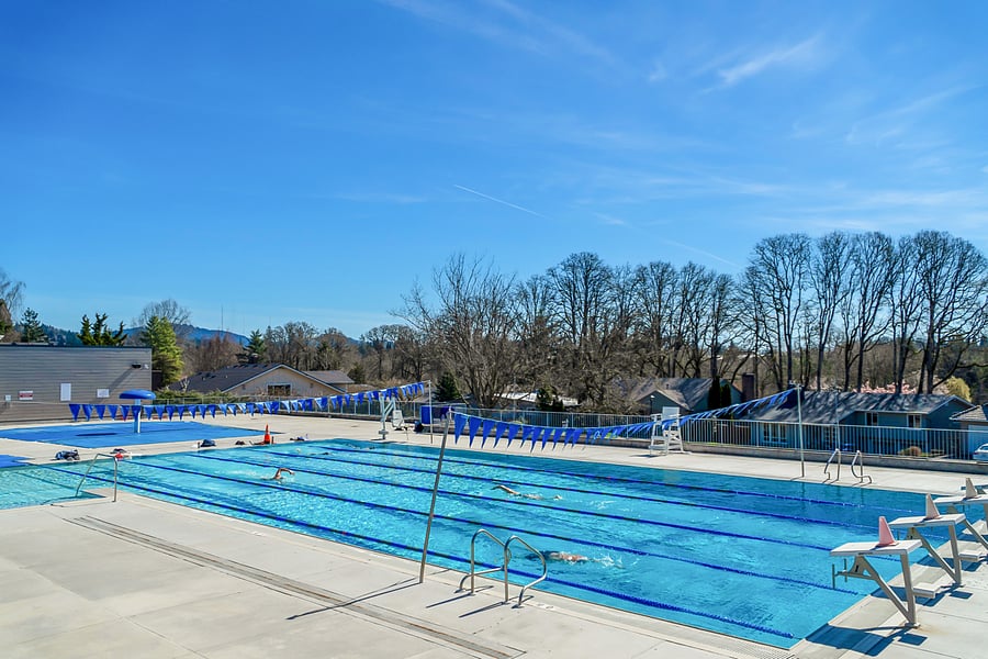 Private community pool directly across from townhome with included access