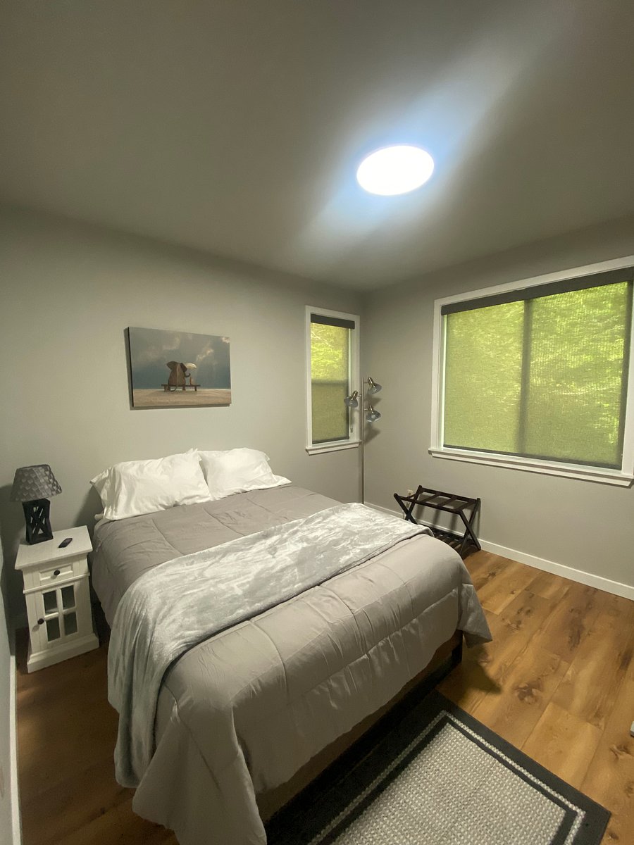Guest room #2 - queen bed and a desk.
