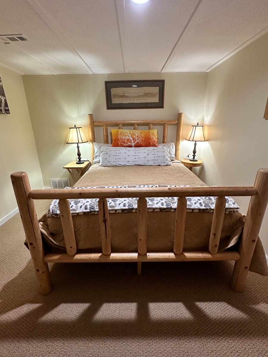 Second bedroom with queen bed ,TV and separate closet