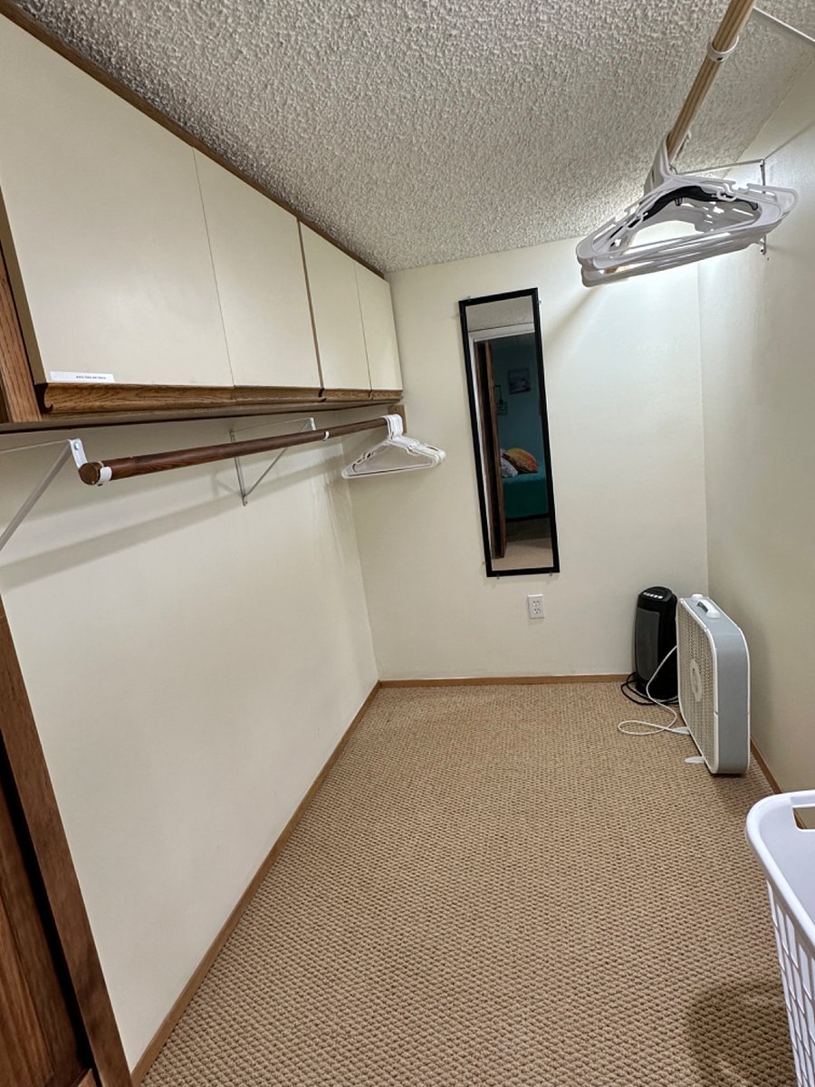 Walk in closet with extra linens