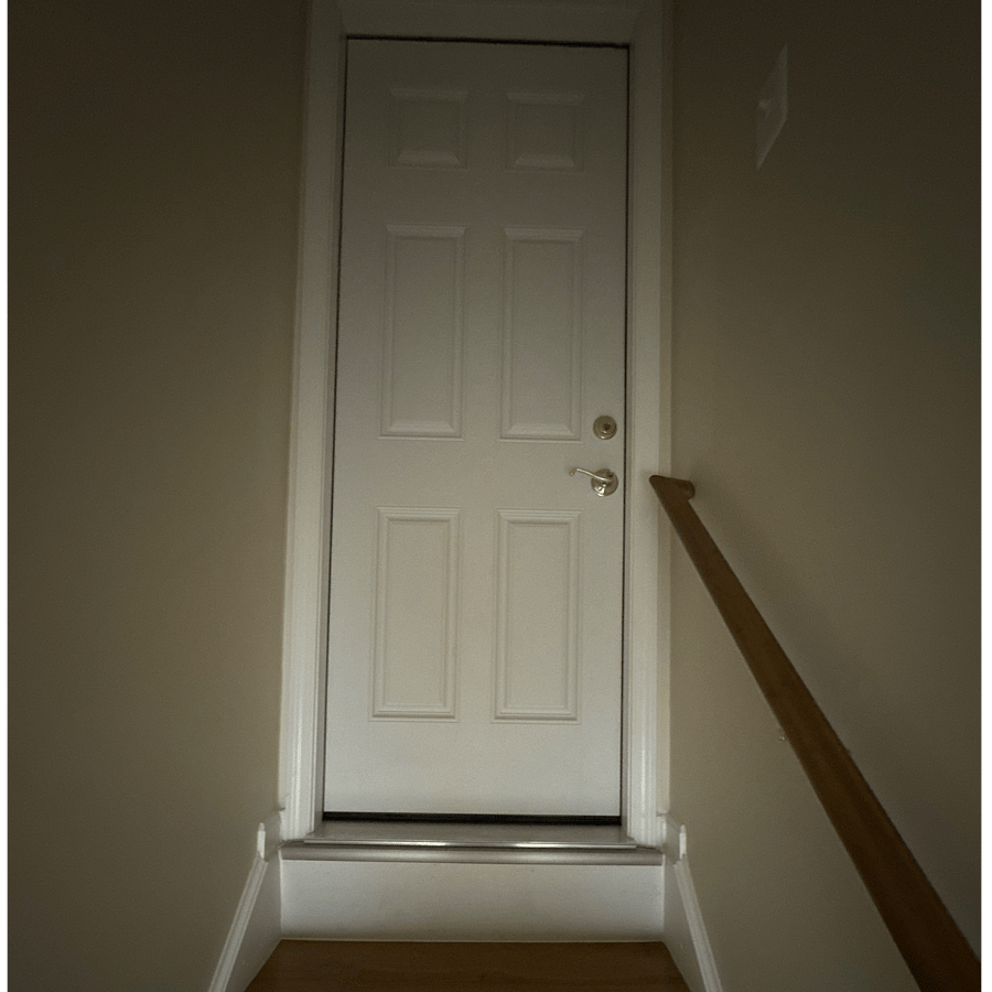 Secured Door to the main house. This door is like the ones you have from the garage. Solid with weatherstripping for noise.