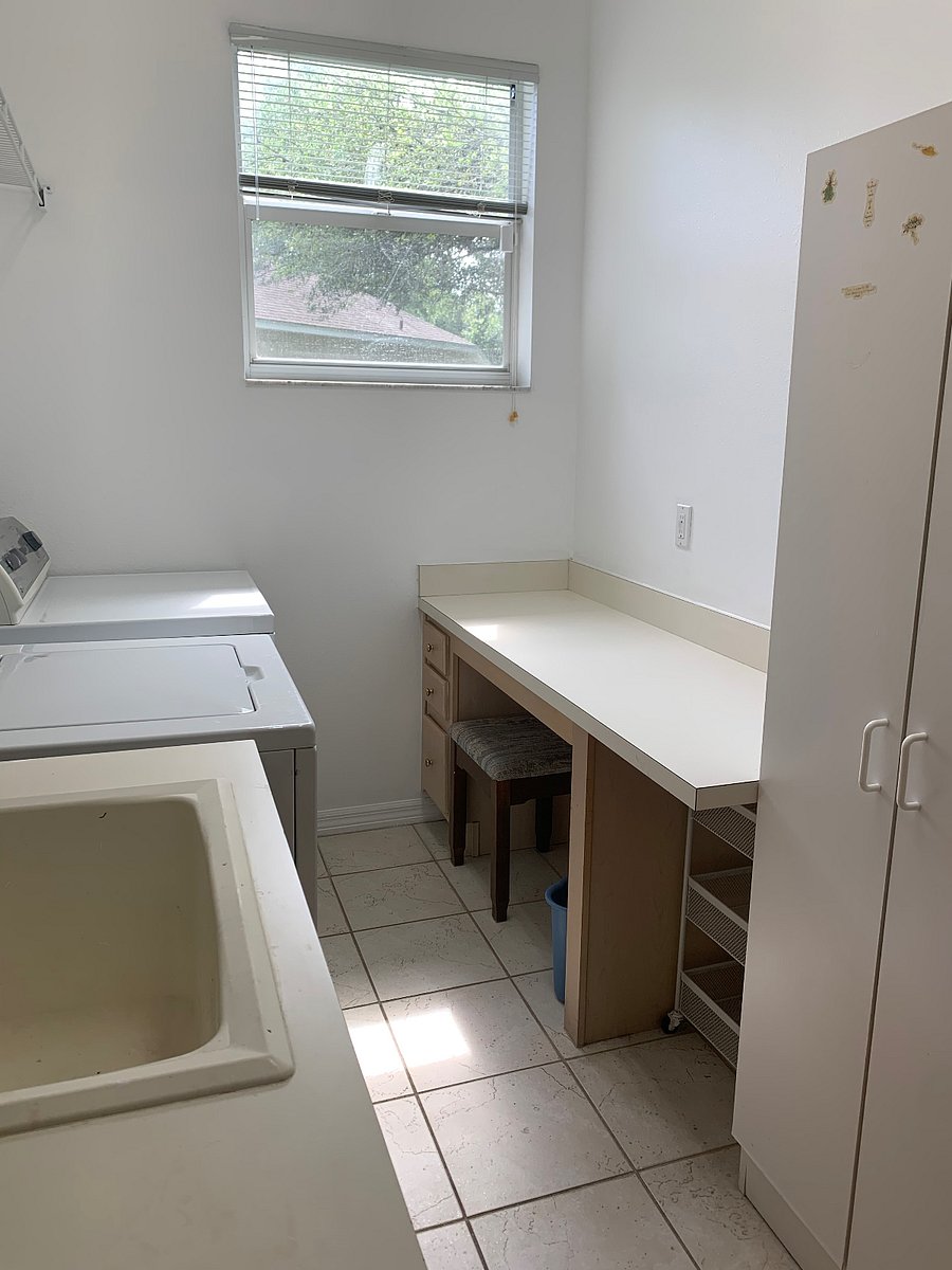 Laundry room has folding & hobby areas!