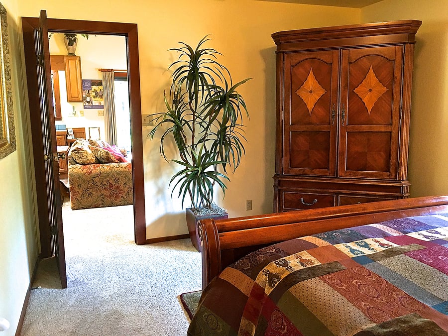 The Bedroom door opens in to the Living Room.  