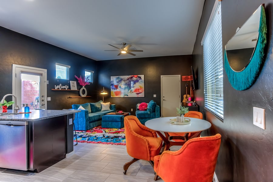 Dining area, living area, and kitchen all conveniently laid out