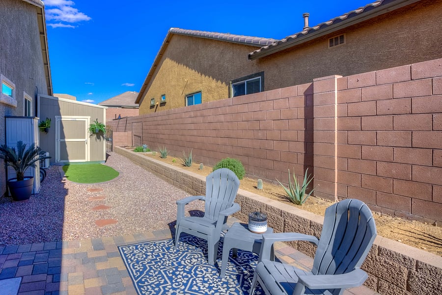 Your own seating area in a shared side yard (owner's will still have access to sheds)