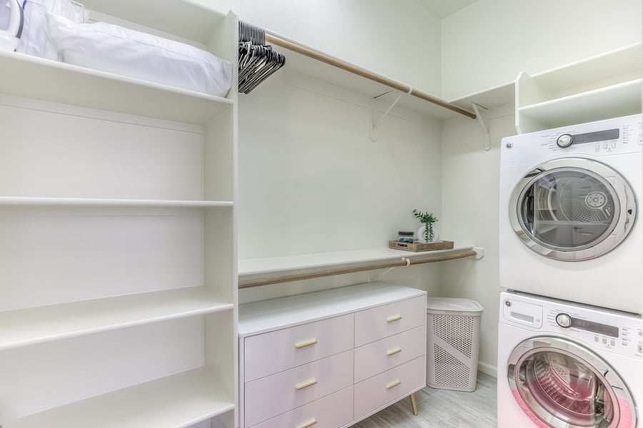 Huge walk-in closet with your own washer/dryer and plenty of storage (even some starter laundry supplies)