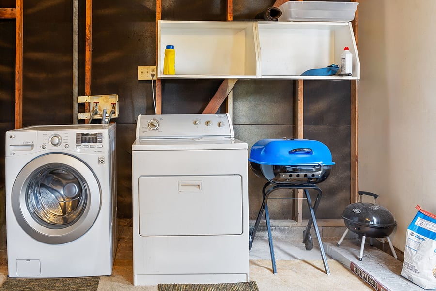 Washer & dryer and grill in the garage