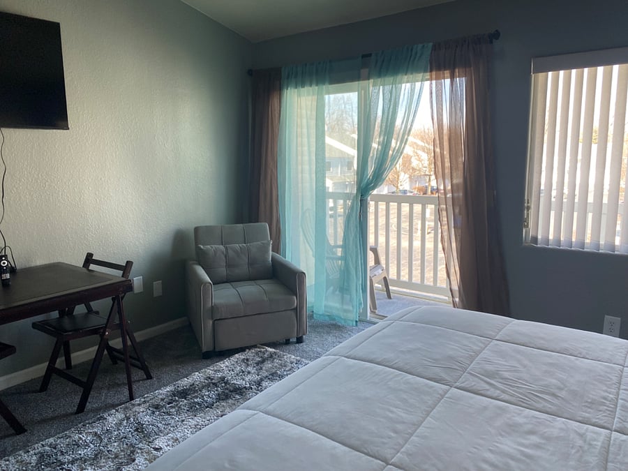 Master bedroom patio door and balcony