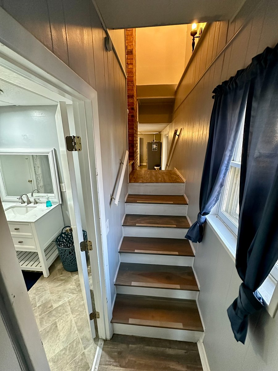 Hallway from TV room to living room.