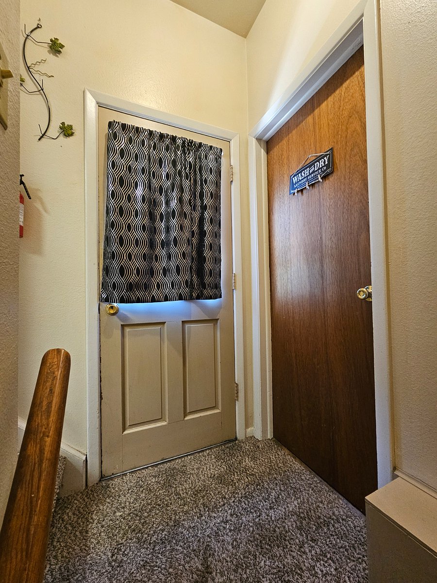 Laundry Room upstairs next to entrance 