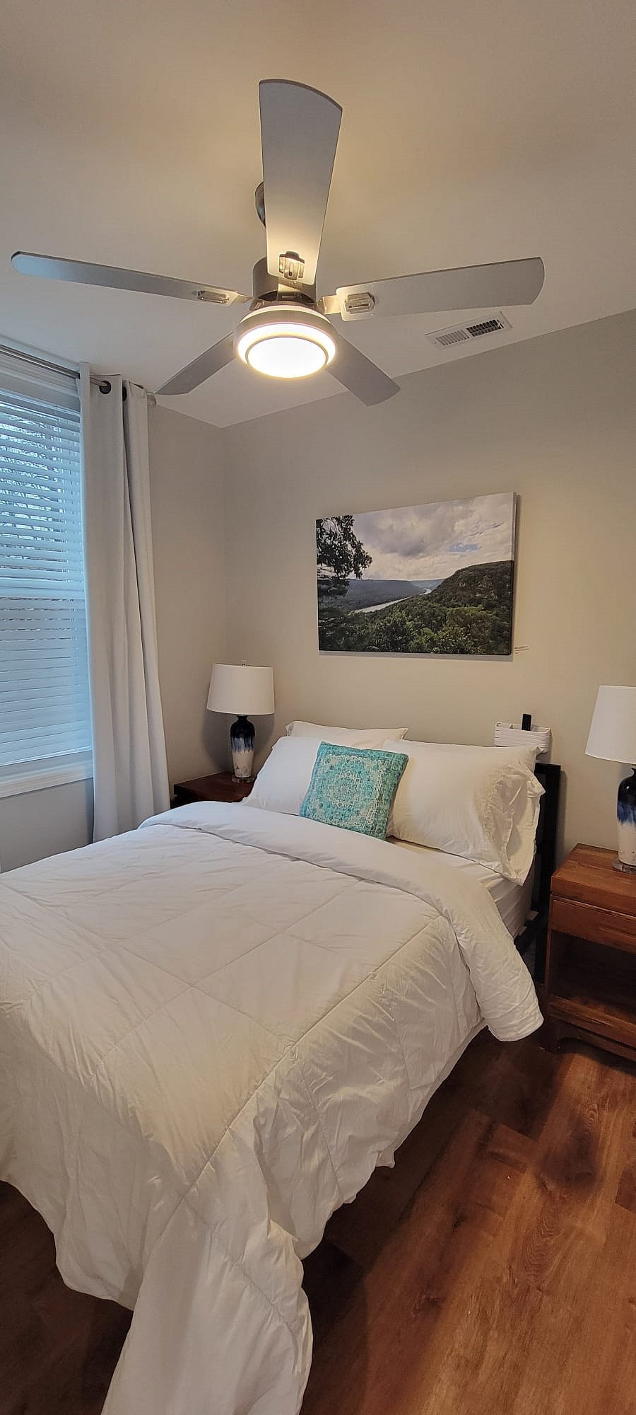 Downstairs smaller bedroom with full-sized bed