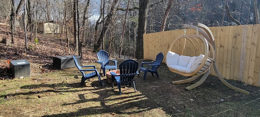 Fire pit, swing chair backyard area