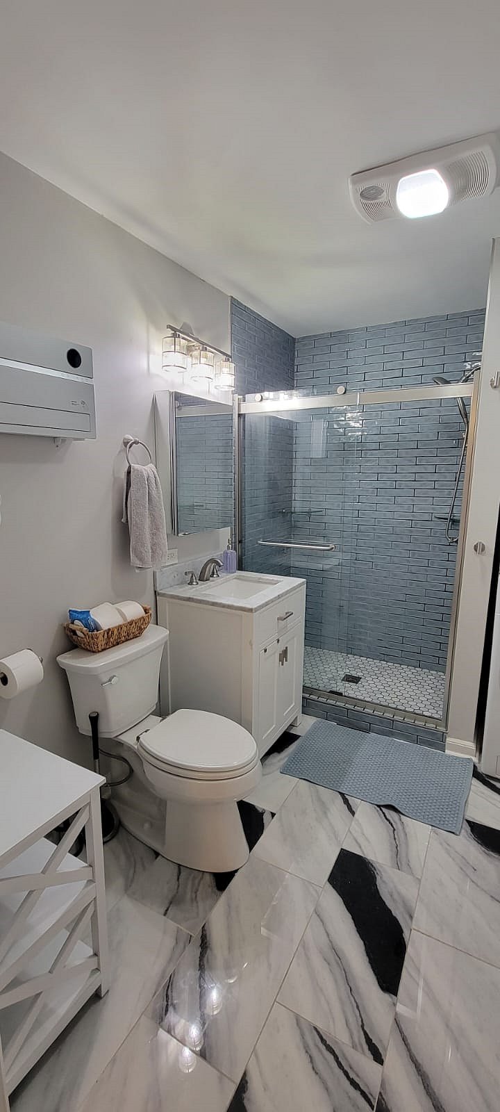 Master bathroom with shower and laundry area