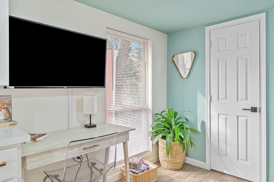Dedicated workspace.  Smart Tv hangs above it.