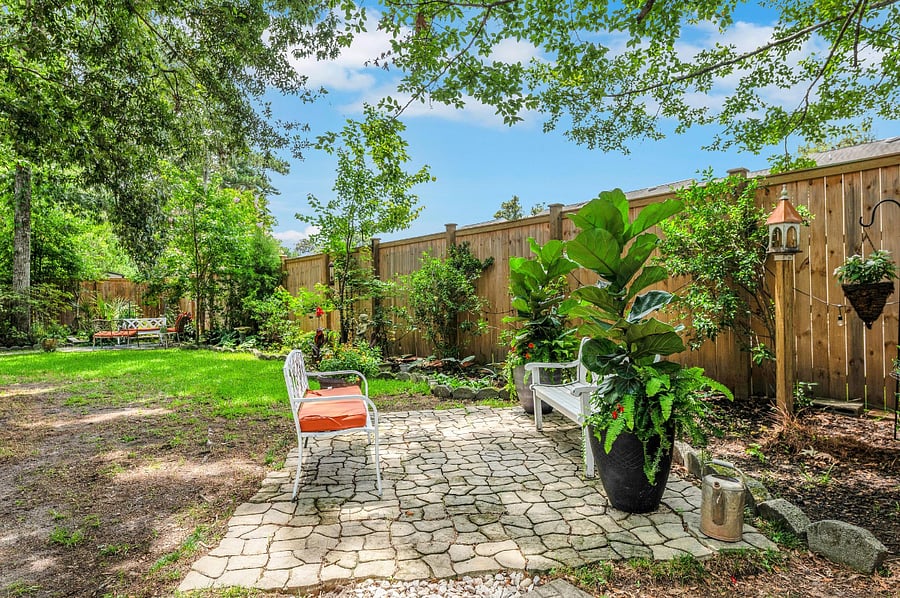 Enjoy 8 foot privacy fence as you find many seating areas in Courtyard to relax and listen to nature. Several WoodPecker species frequent here