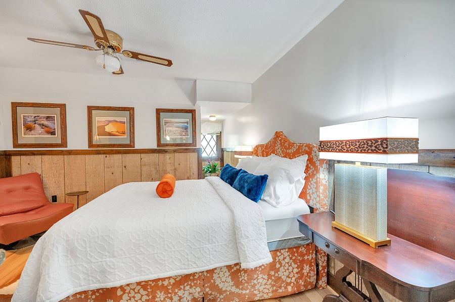 Transition Bedroom for guests who may need to check in prior to another guest checking out. This guest room has a writing desk.
