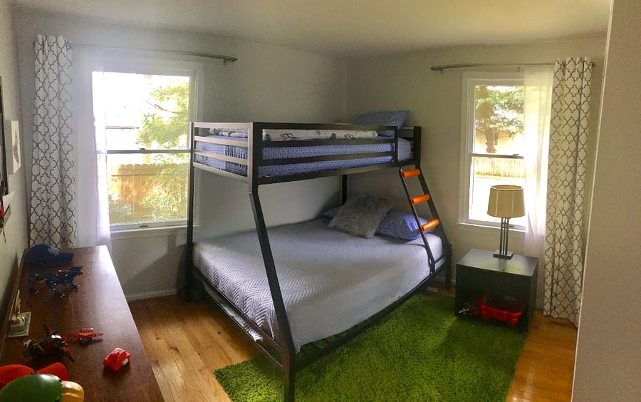 Bunk Bed room with double bed on bottom and single on top