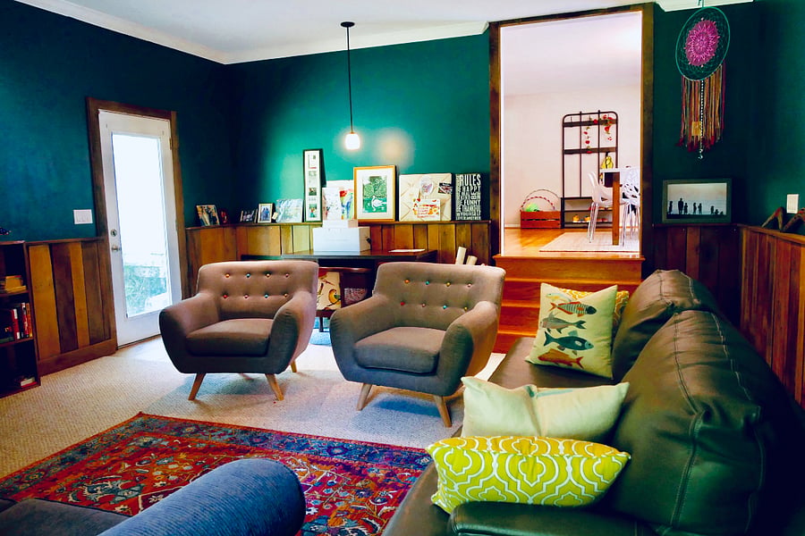 Family Room - custom paint, family photos, desk , TV, 3 steps. 