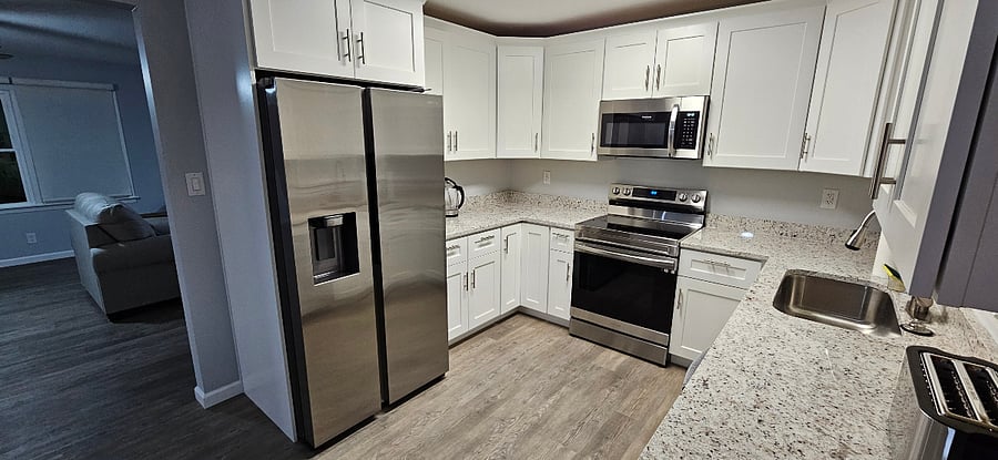 Kitchen - new stainless steel appliances - lots of storage & counter space