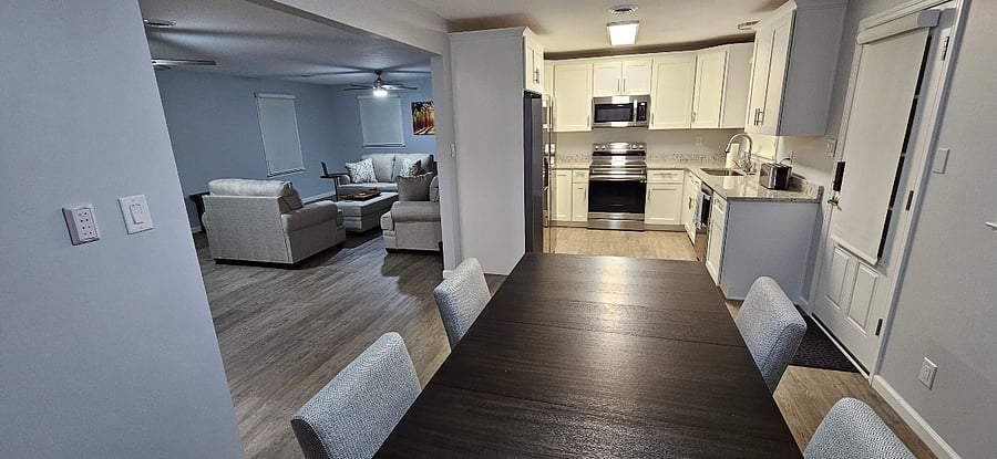 View of living room & kitchen from table