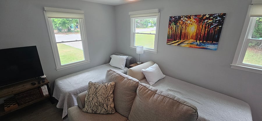 Living room - 2 additional single beds can be added for tenant