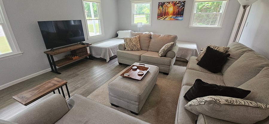 Living room - 2 additional single beds can be added for tenant