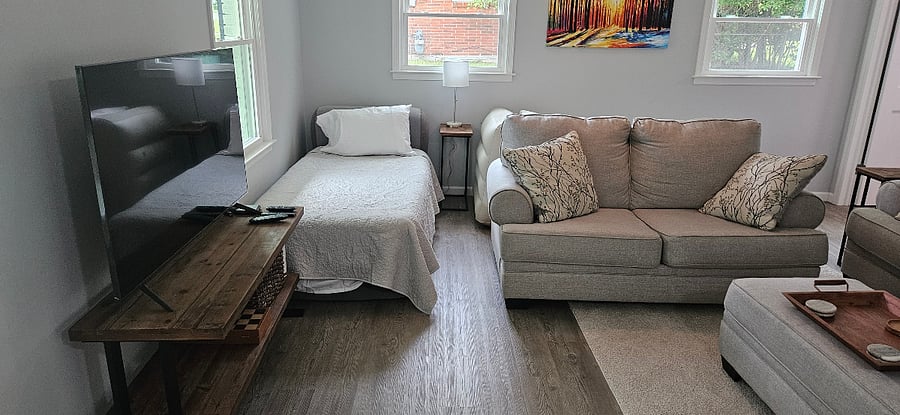 Living room - 2 additional single beds can be added for tenant