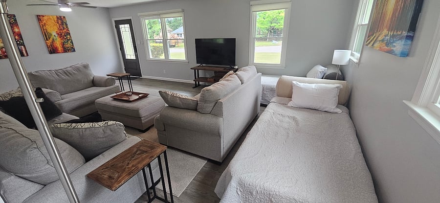 Living room - 2 additional single beds can be added for tenant