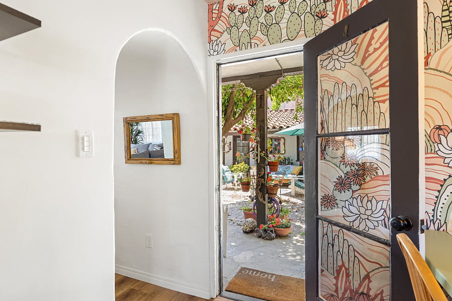 Left kitchen door leading to courtyard