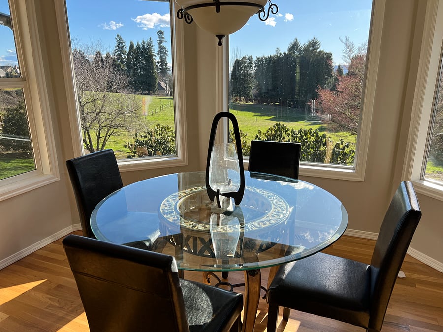 kitchen dining nook with view of horse pasture and at times, horses.  