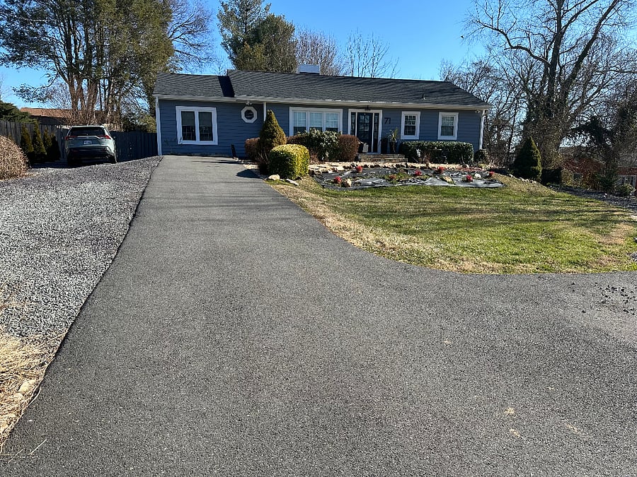 Front of the house, driveway. Dedicated parking spot