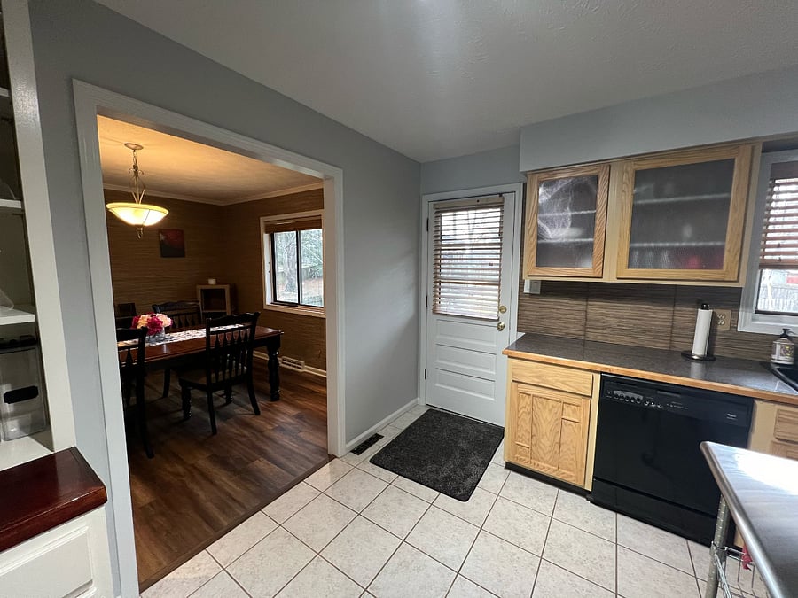 Kitchen:
Open to dining room & living room.
Back door leads to deck + fenced in yard.