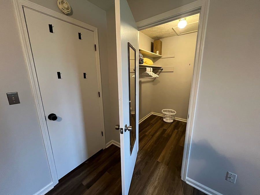 Master Bedroom: walk in closet, full length mirror, hooks on back of door