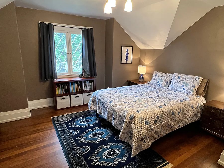 Upstairs bedroom with queen bed. Portable AC unit available for Summer months. 
