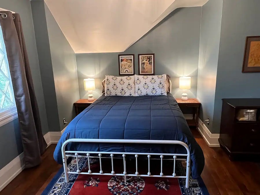 Third upstairs bedroom with queen bed. Portable AC unit available for Summer months. 
