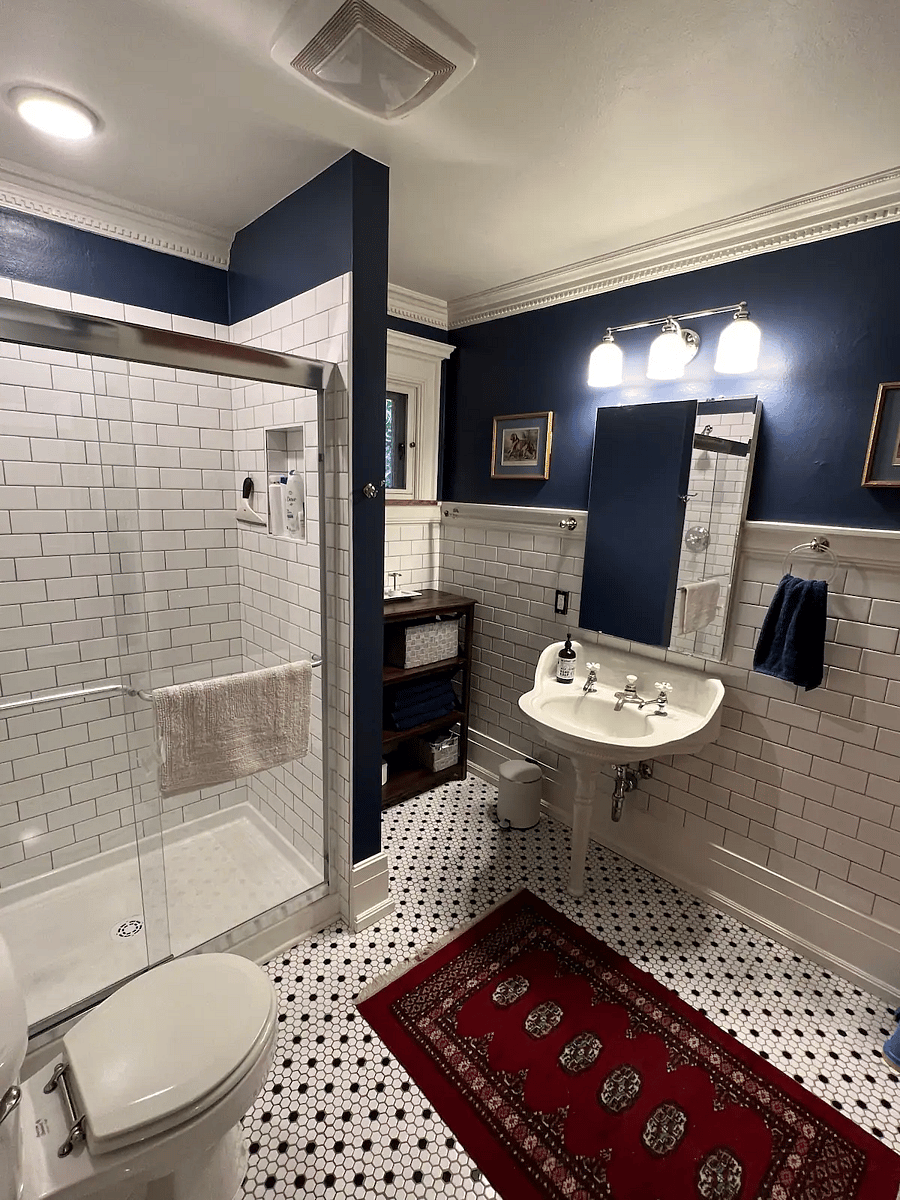 Main floor bathroom with updated walk-in shower. 