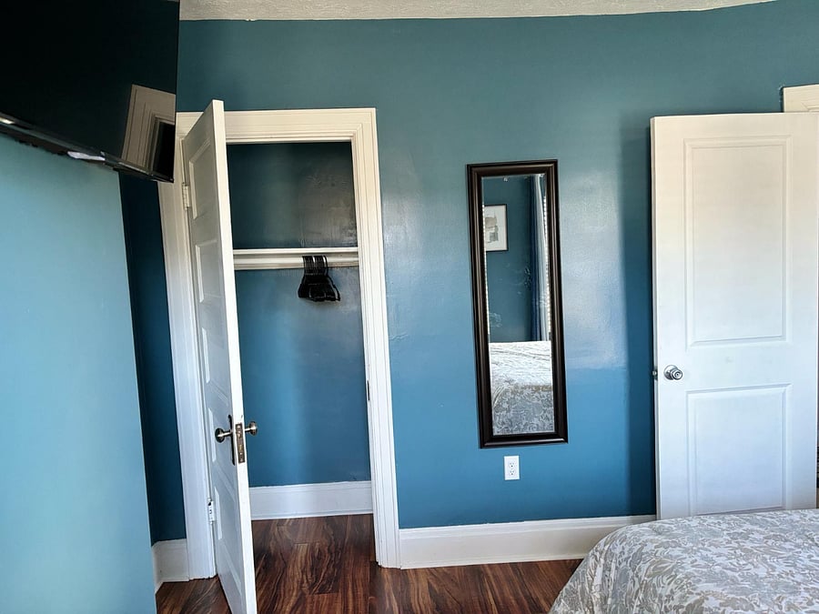 Spacious closet and two mirrors in this room!
