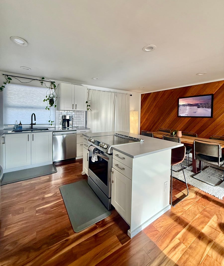 Full kitchen with sliding door to back deck