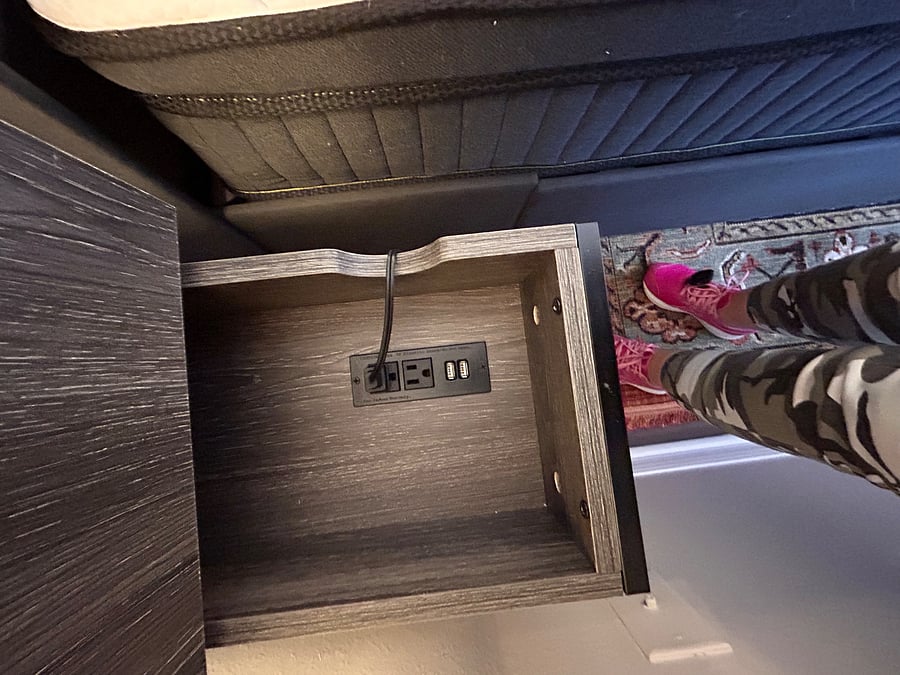 Outlet and USB ports in each bedside table