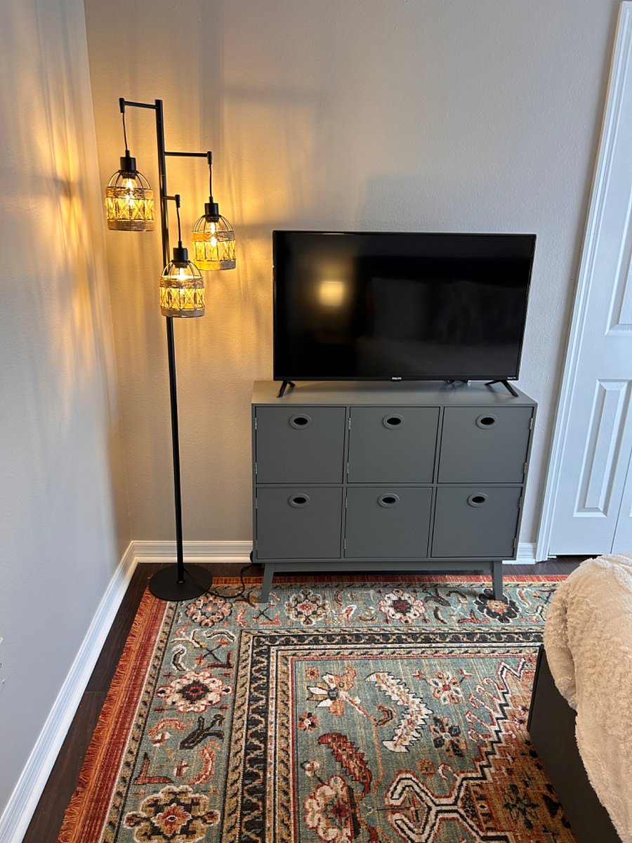 Cabinet for storage and 40" Philips Smart Roku TV
