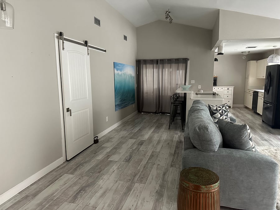 Barn door leading to bedroom/bathroom 2
