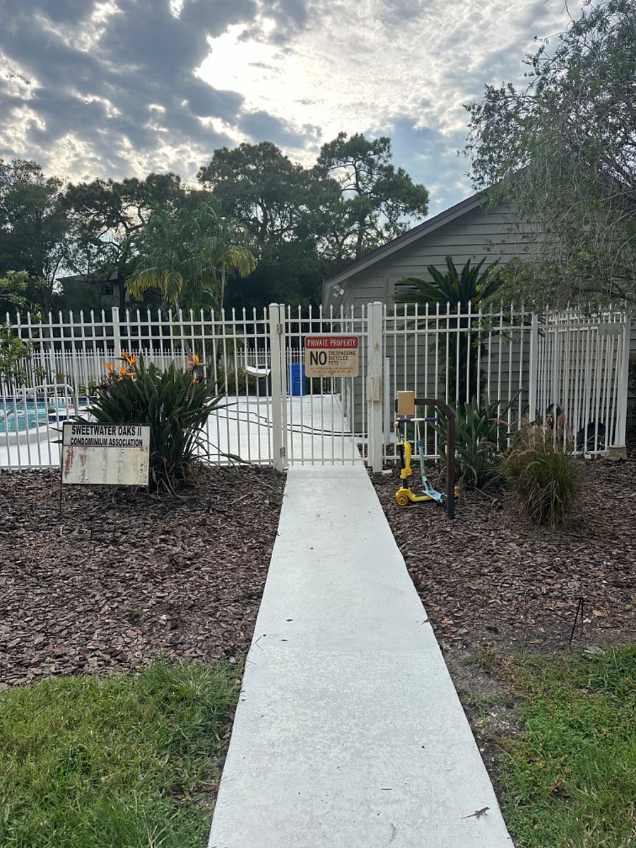 Community pool entrance. Pool area just resurfaced.
