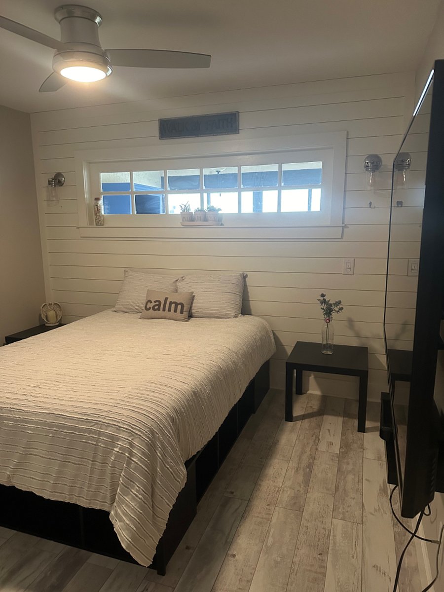 Bedroom 2 behind barn door