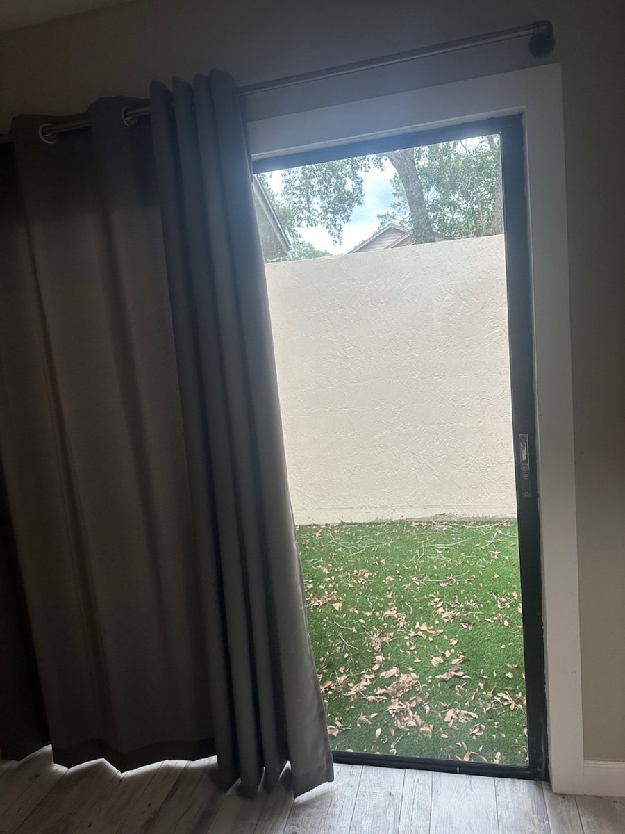 Outdoor little terrace off primary bedroom