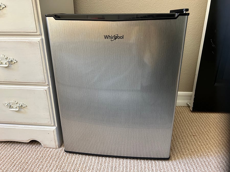 Mini Fridge in room.